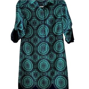 This stunning tunic dress from The Limited is perfect for any occasion. The teal